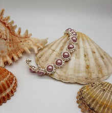 Carica l'immagine nel visualizzatore di Gallery, Braccialetto di perle da donna rosa con cuore di cristallo