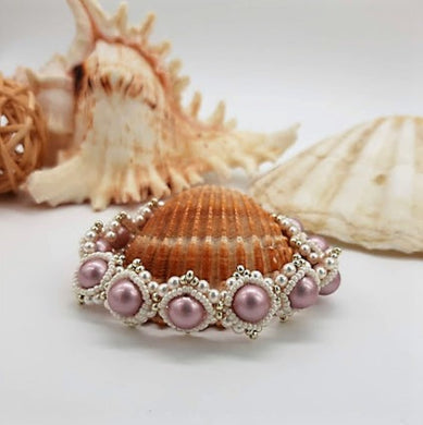 Bracciale di perle da donna rosa con cuore di cristallo 