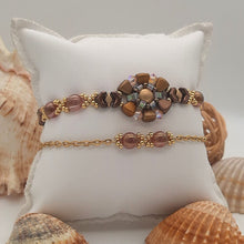 Carica l&#39;immagine nel visualizzatore di Gallery, Braccialetti particolari in rosa e rame antico con perle di vetro, cristalli e acciaio
